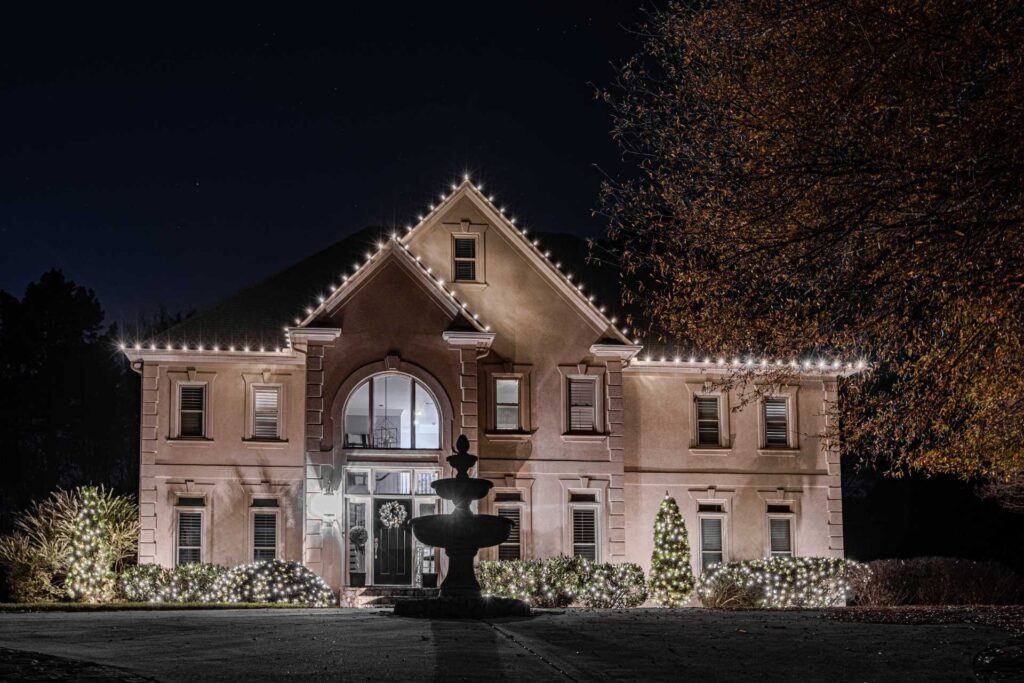 Roofline Christmas lights on a residential property in the existing Smyrna website image library